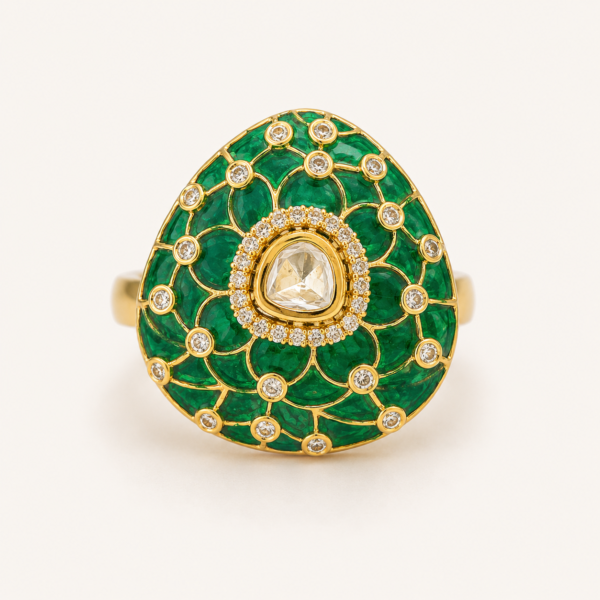 Kundan ring for women with green teardrop mosaic design, white centre stone and polished gold finish