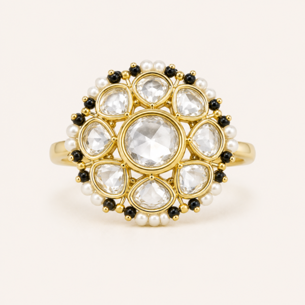 Polki ring for women with white floral stones, black beads, pearl accents and polished gold finish
