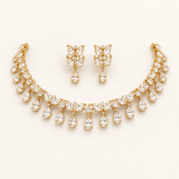 Polki necklace set for women with leaf-shaped stones, teardrop drops and matching earrings