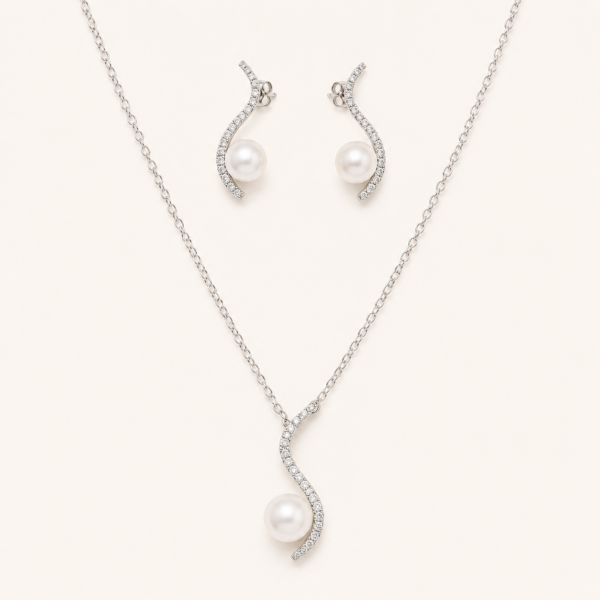 American diamond pearl pendant set with matching earrings and silver-tone chain