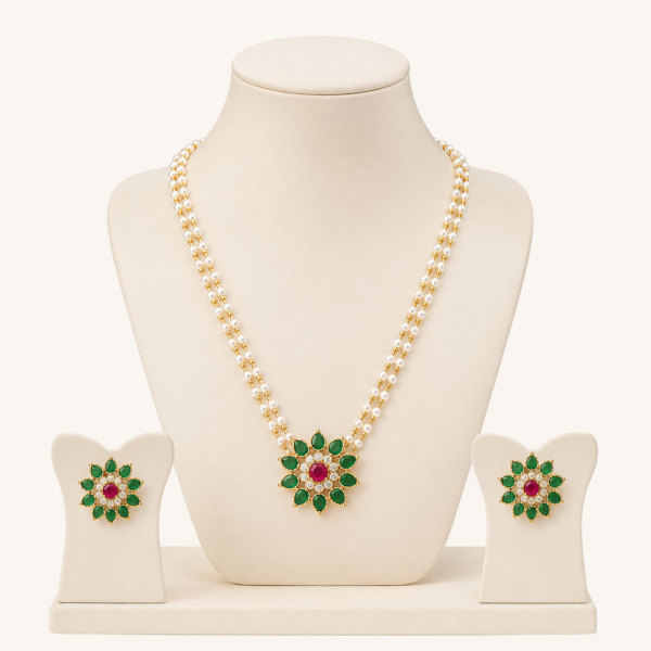 Traditional pearl necklace set for women with floral centrepiece and matching earrings