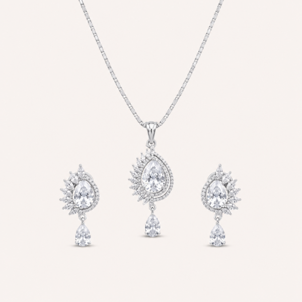 AD pendant set for women with teardrop centre stone, delicate chain and matching drop earrings