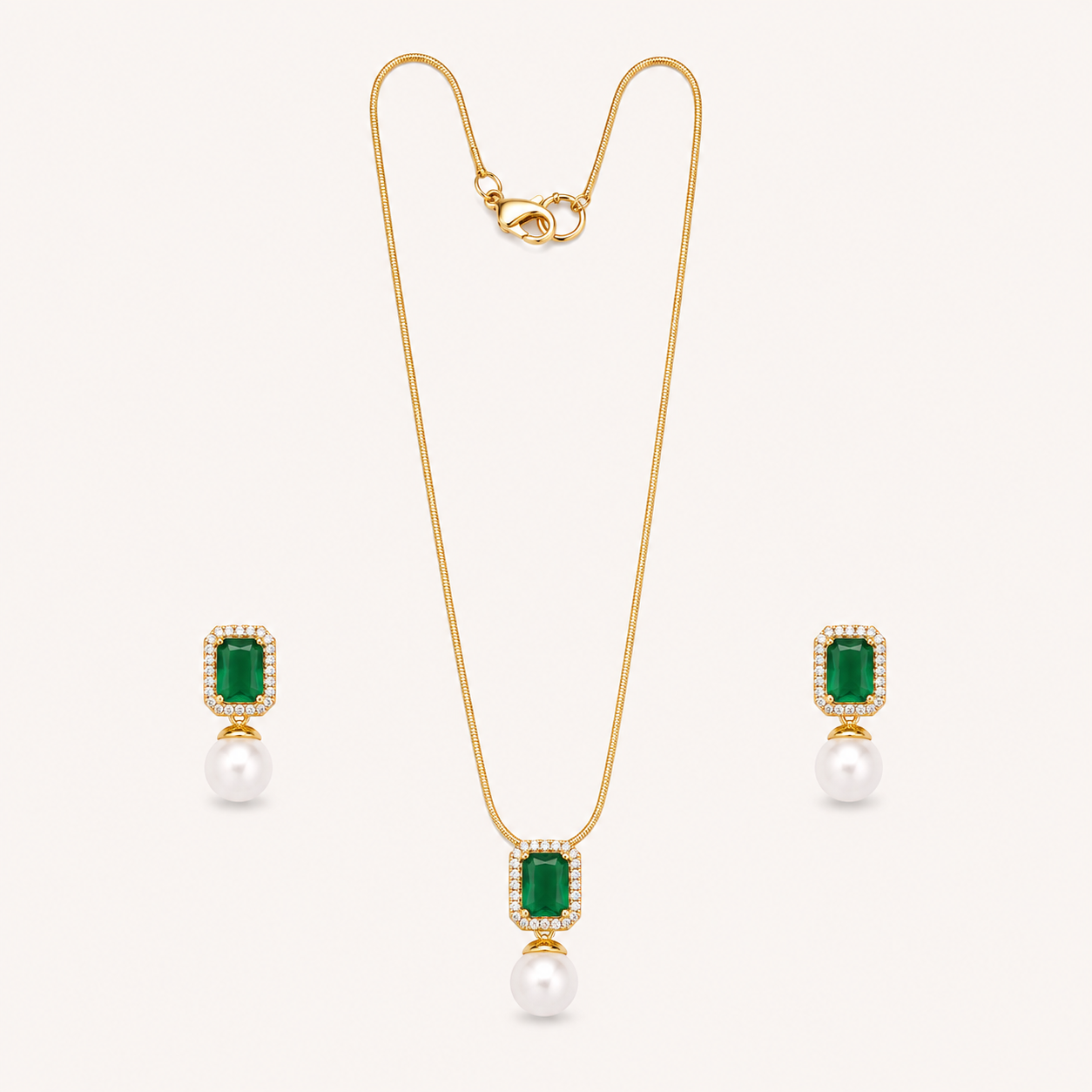 Emerald Grace AD Pendant Set for Women | Gold Finish AD pendant set for women with rectangular centre, pearl drop, gold-tone chain and matching earrings