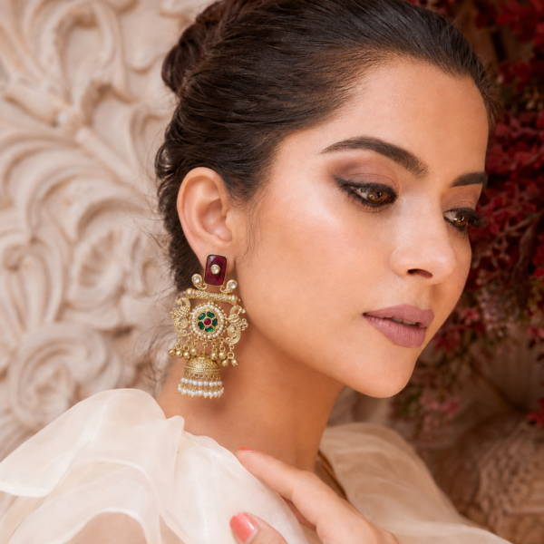Pachi Kundan jhumka earrings with twin peacock motifs, a floral medallion and engraved dome drops