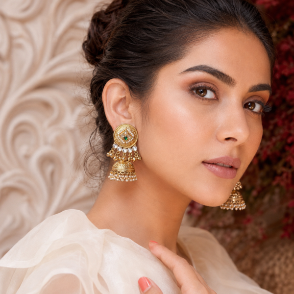 Lightweight jhumka earrings with engraved floral medallions, ghungroo details and pearl-like drops