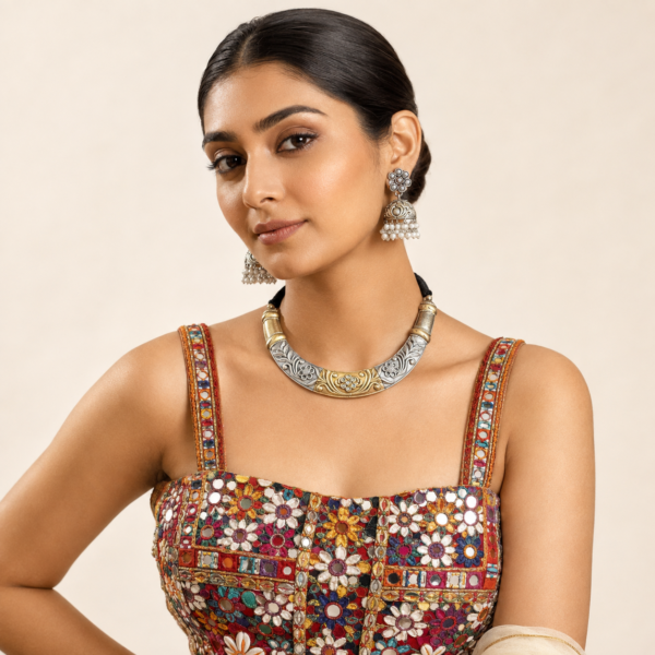 Oxidised necklace set with earrings featuring a floral collar neckpiece and matching jhumkas